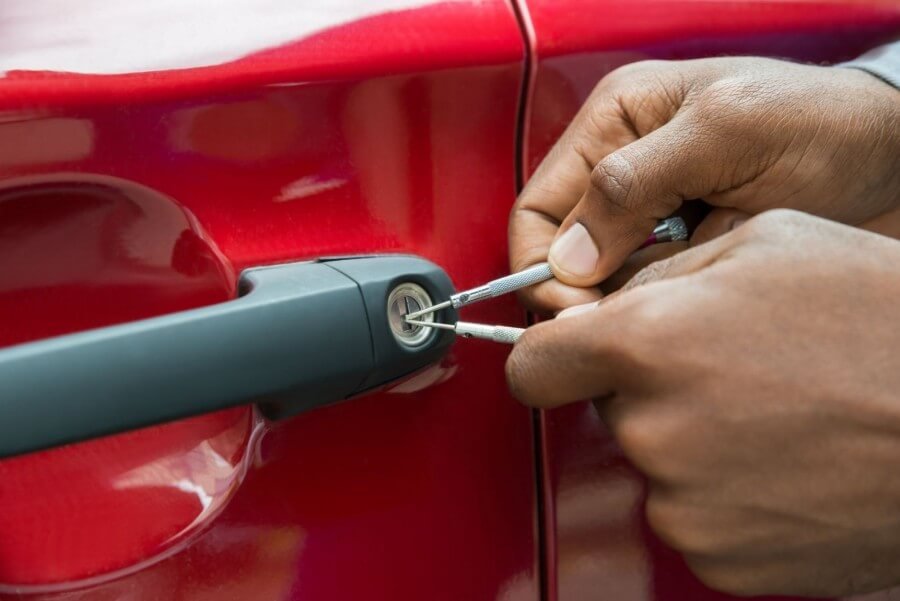 Professional locksmith handling real automotive emergencies